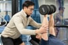 Physiotherapy Guiding Patient in Bench Press